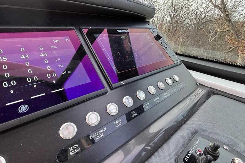 Slide: The Image of Dashboard of 2026 Monterey 385 Super Express with digital displays and control buttons. - 18