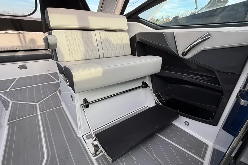 Slide: The Image of 2026 Monterey 385 Super Express interior with modern seating and sleek design. - 25