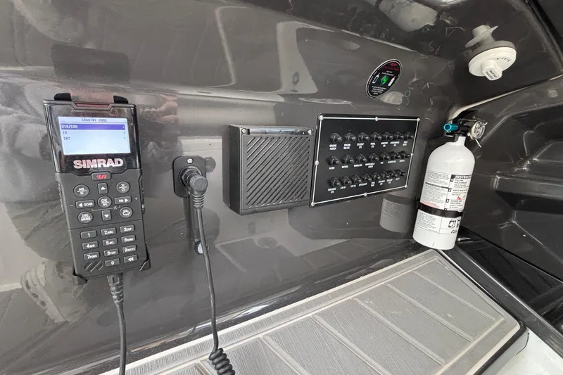 Slide: The Image of Control panel of 2026 Monterey 385 Super Express with radio and fire extinguisher. - 34