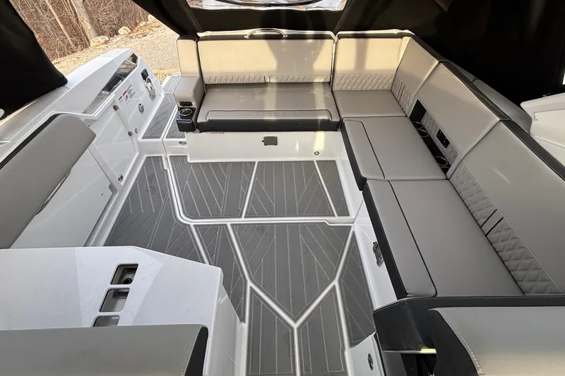 Slide: The Image of 2026 Monterey 385 Super Express boat interior with sleek seating and modern design. - 35