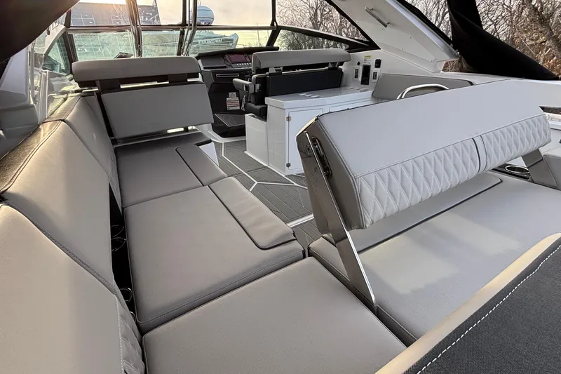 Slide: The Image of Interior of 2026 Monterey 385 Super Express yacht with luxurious seating and modern design. - 45