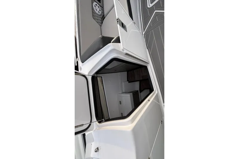 Slide: The Image of 2026 Monterey 385 Super Express boat interior with sleek design and modern amenities. - 54