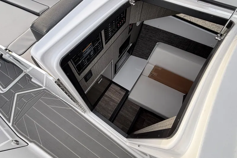 Slide: The Image of Interior view of 2026 Monterey 385 Super Express yacht cabin, featuring modern design and seating. - 59