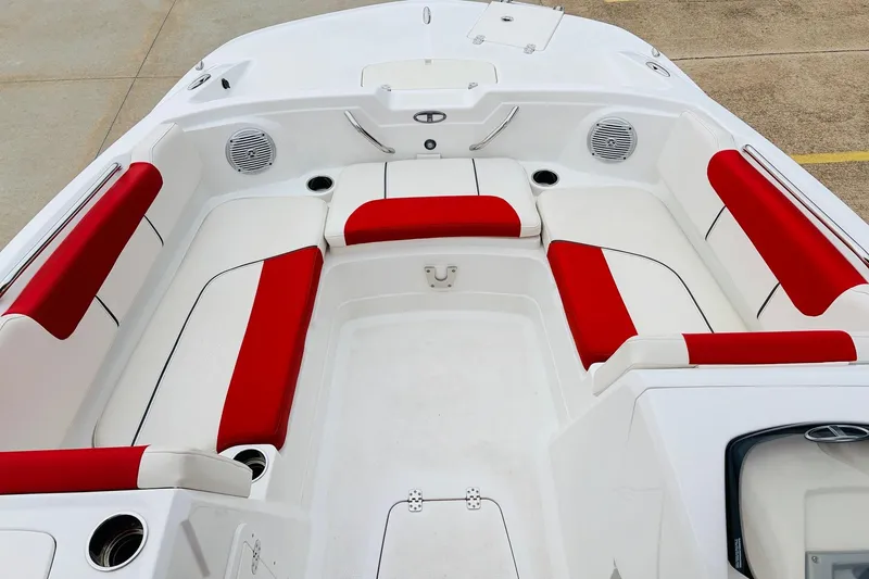 Slide: The Image of 2021 Tahoe 1950 boat interior with red and white seating, spacious layout. - 11