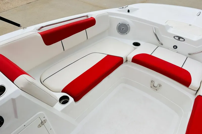 Slide: The Image of Red and white seating on a 2021 Tahoe 1950 boat interior. - 14