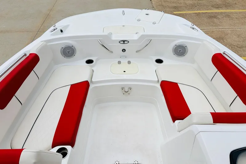 Slide: The Image of Interior of 2021 Tahoe 1950 boat with red and white seating. - 19