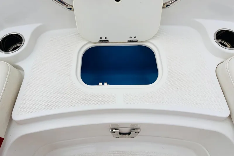 Slide: The Image of Open storage compartment on a 2021 Tahoe 1950 boat deck. - 20