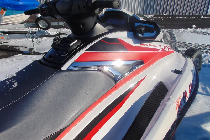 Slide: The Image of 2016 Yamaha WaveRunner VXR in snow, showcasing sleek design and vibrant red accents. - 10
