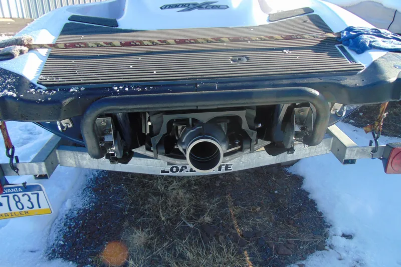 Slide: The Image of 2016 Yamaha WaveRunner VXR on trailer, rear view with snow and grass. - 8