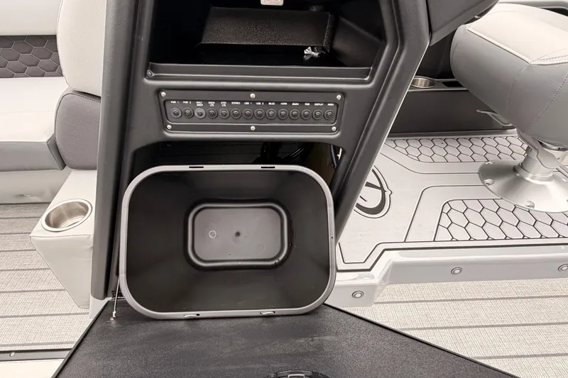 Slide: The Image of Interior of 2026 Veranda VR 235 VL boat, featuring control panel and seating area. - 11