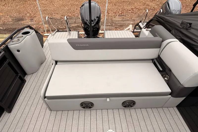 Slide: The Image of 2026 Veranda VR 235 VL boat interior with gray seating and cup holders. - 14