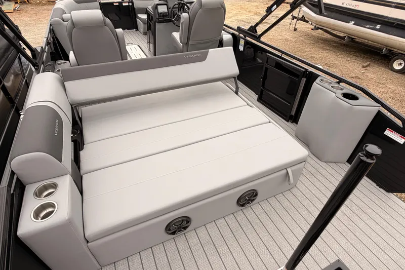 Slide: The Image of 2026 Veranda VR 235 VL pontoon boat interior with luxurious seating and cup holders. - 16