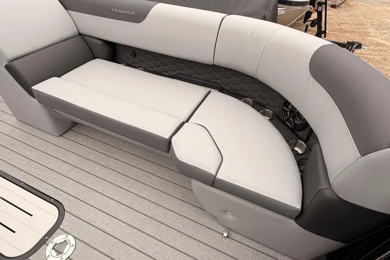 Slide: The Image of 2026 Veranda VR 235 VL boat interior with luxurious gray seating and cup holders. - 6