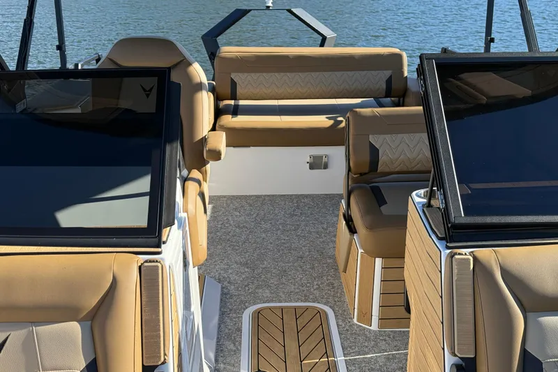Slide: The Image of Luxurious interior of 2026 Revel RS25 boat with tan leather seating and modern design. - 17