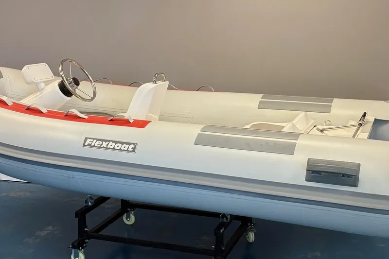 The Image of 2019 Flexboat SR12 SLX inflatable boat on display stand. - 1