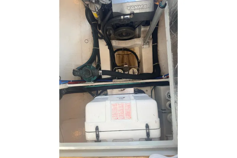Slide: The Image of Engine compartment of a 2006 True North 38 boat with Yanmar components. - 22