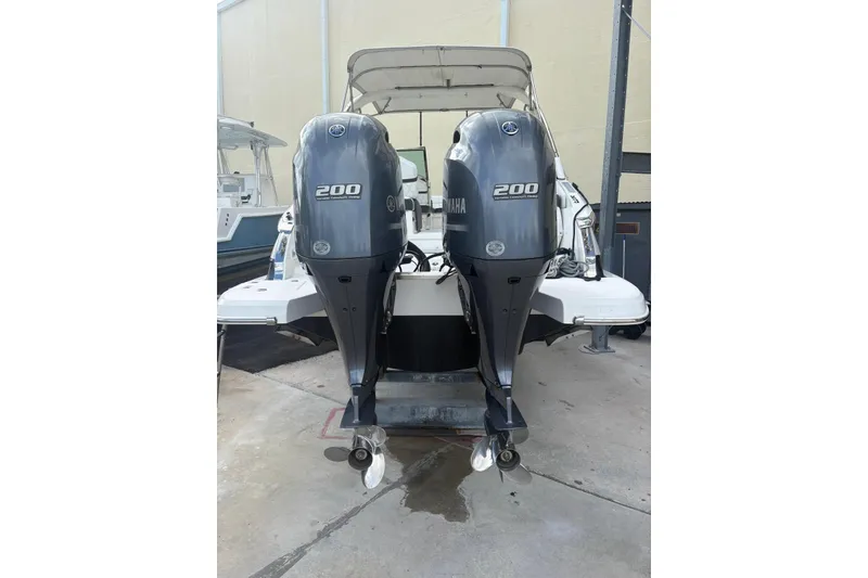 Slide: The Image of 2022 Regal 29 OBX boat with twin Yamaha 200 outboard engines. - 29