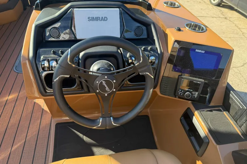Slide: The Image of Steering wheel and dashboard of Bentley Pontoons Elite 253 Swingback 2026. - 5