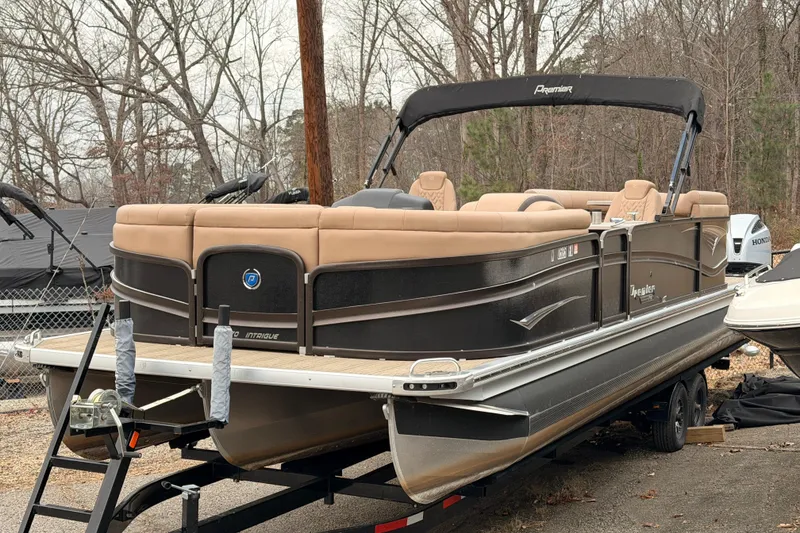 The Image of 2023 Premier 270 Intrigue REV 10 Wide Twin Engine on trailer. - 0