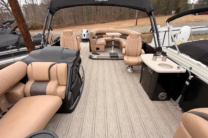 Slide: The Image of Luxurious interior of 2023 Premier 270 Intrigue REV 10 Wide Twin Engine pontoon boat. - 14