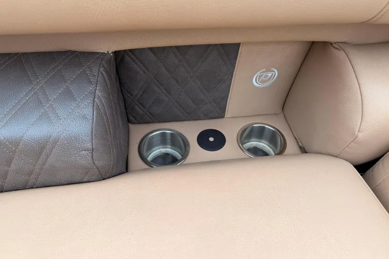 Slide: The Image of Luxurious seating with cup holders in 2023 Premier 270 Intrigue REV 10 Wide Twin Engine. - 7