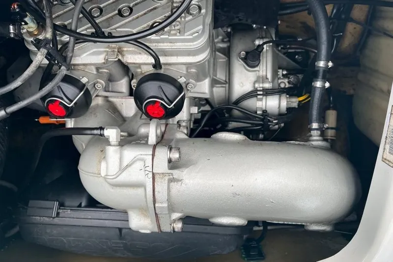 Slide: The Image of 2001 Sea-Doo GTX engine with visible components and wiring. - 4