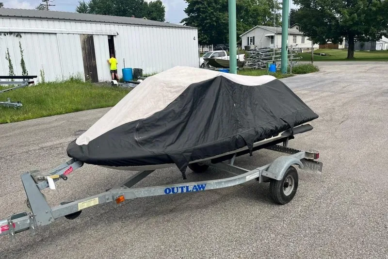 Slide: The Image of Covered 2001 Sea-Doo GTX on trailer in outdoor setting. - 5