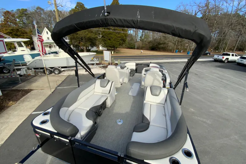 Slide: The Image of 2021 Avalon LSZ Quad Lounger 24' pontoon boat with spacious seating and canopy. - 12