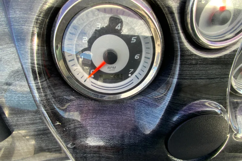 Slide: The Image of Close-up of 2021 Avalon LSZ Quad Lounger tachometer displaying RPM gauge. - 16