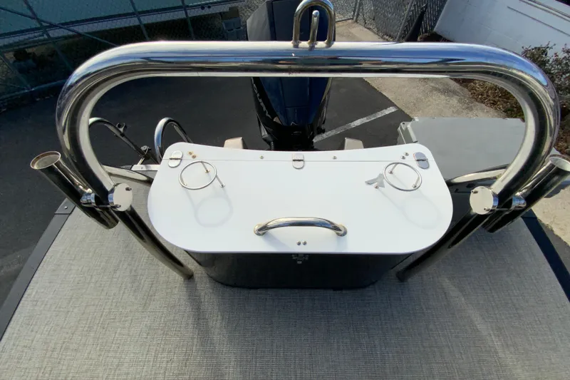 Slide: The Image of 2021 Avalon LSZ Quad Lounger boat with stainless steel railings and cup holders. - 27