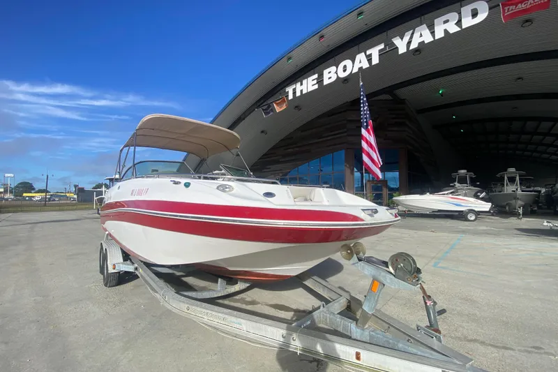 Slide: The Image of 2007 NauticStar 230DC Sport Deck boat on trailer at The Boat Yard. - 9
