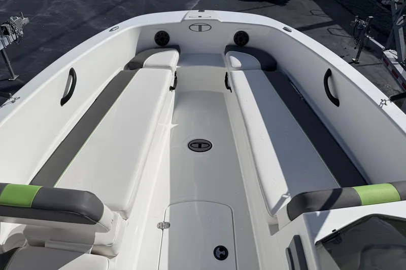 Slide: The Image of 2023 Tahoe T18 boat interior with cushioned seating and modern design. - 19