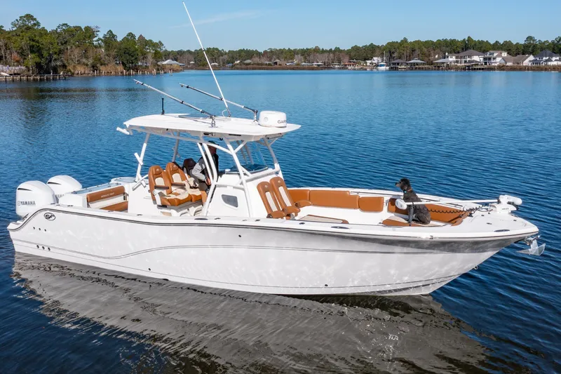 The Image of 2019 Sea Fox 328 Commander boat on calm water, featuring dual Yamaha engines. - 0