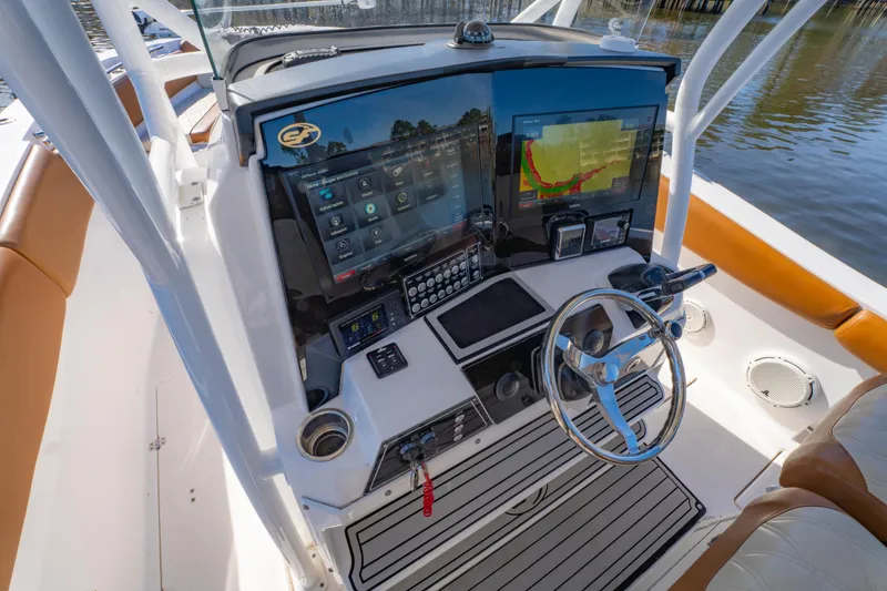 Slide: The Image of 2019 Sea Fox 328 Commander helm with advanced navigation and control systems. - 17
