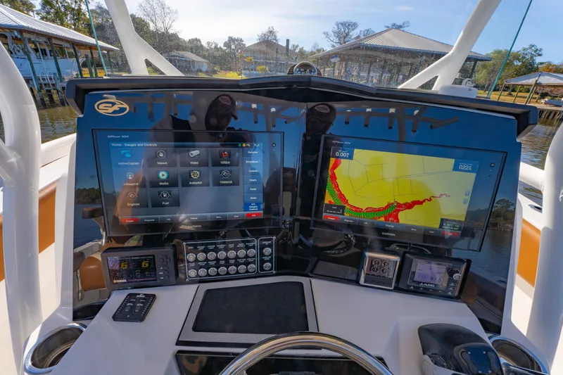 Slide: The Image of 2019 Sea Fox 328 Commander dashboard with advanced navigation and control systems. - 19
