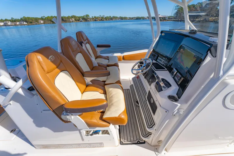 Slide: The Image of 2019 Sea Fox 328 Commander boat interior with leather seats and advanced navigation system. - 20