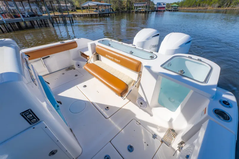 Slide: The Image of 2019 Sea Fox 328 Commander boat interior with seating and Yamaha engines. - 27