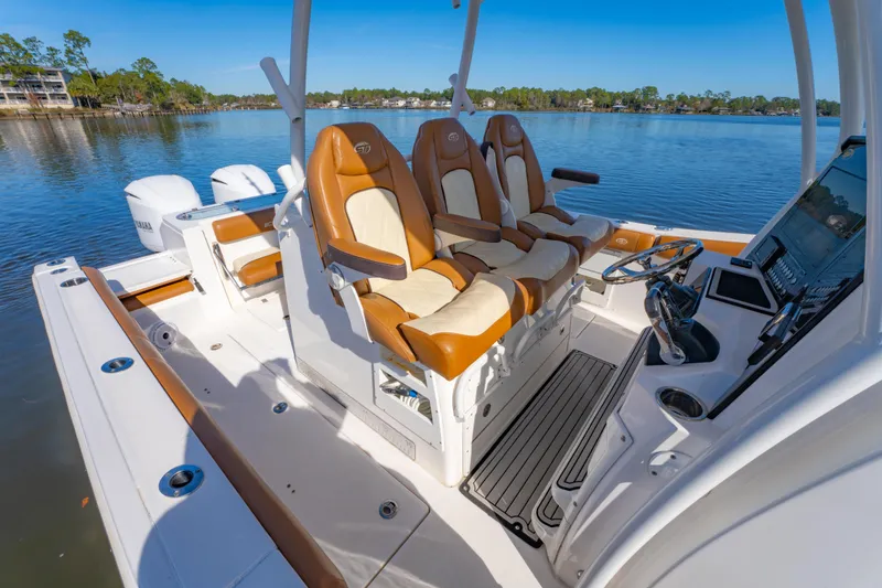 Slide: The Image of 2019 Sea Fox 328 Commander boat interior with luxurious seating and modern controls. - 34