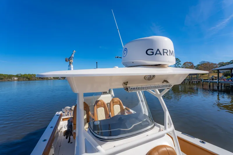 Slide: The Image of 2019 Sea Fox 328 Commander boat with Garmin radar on calm water. - 37