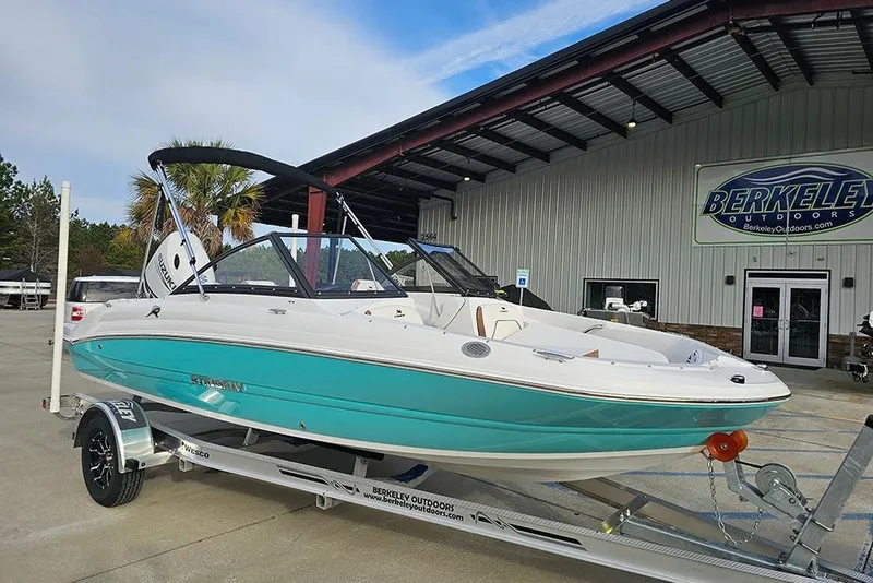 The Image of 2026 Stingray 191 DC boat on trailer at Berkeley Outdoors dealership. - 1