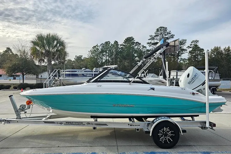 Slide: The Image of 2026 Stingray 191 DC boat on trailer at outdoor dealership. - 5