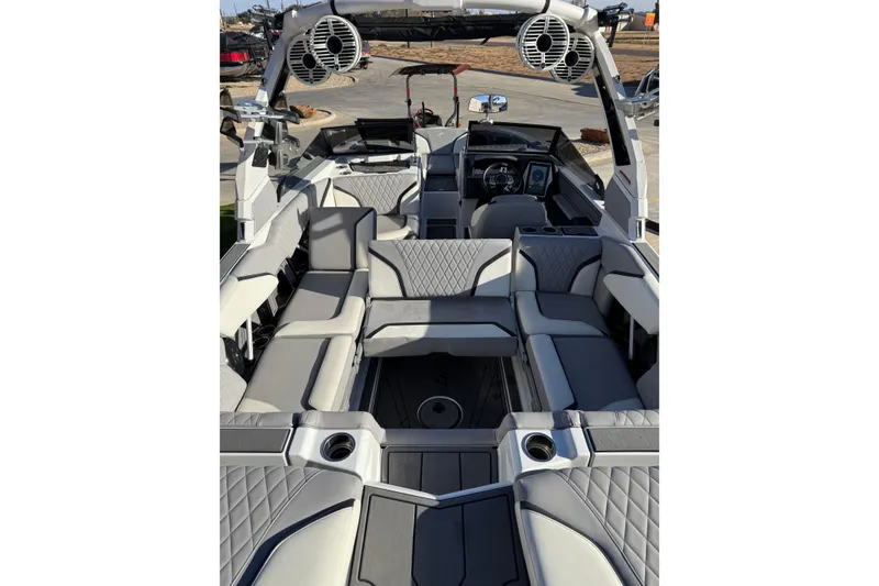 Slide: The Image of 2022 Tigé 24RZX boat interior with luxurious seating and modern design. - 14
