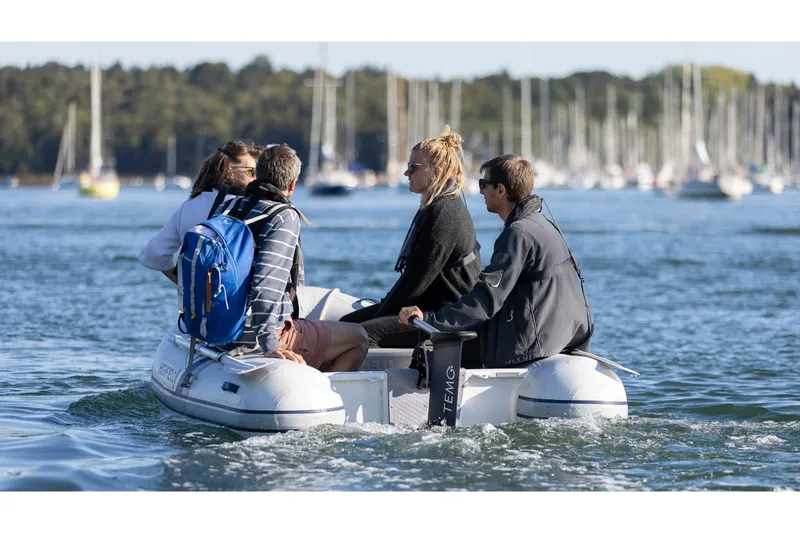 Slide: The Image of Group on Highfield Roll-Up 230 KAM boat, 2026 model, at sea. - 5