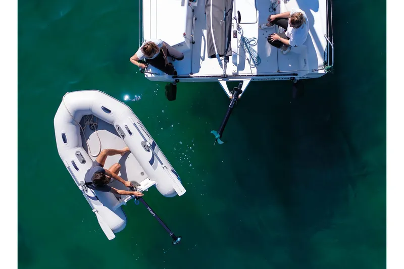 Slide: The Image of Aerial view of Highfield Roll-Up 230 KAM inflatable boat on water. - 4