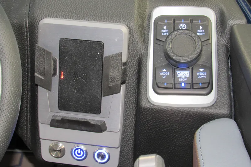 Slide: The Image of Control panel of 2026 Malibu Wakesetter 25 LSV with wireless charging and surf settings. - 13