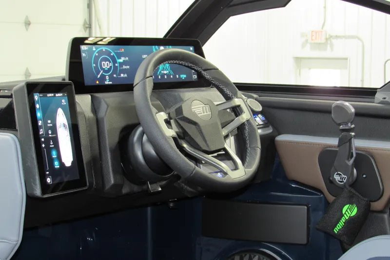 Slide: The Image of 2026 Malibu Wakesetter 25 LSV dashboard with advanced digital displays and steering wheel. - 15