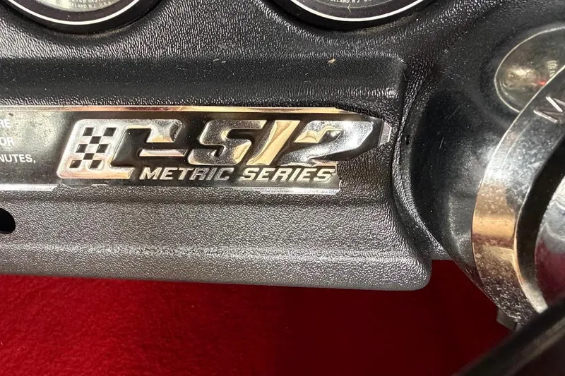 Slide: The Image of Dashboard of 1981 Glastron/Carlson C-512 Metric Series boat with emblem. - 35