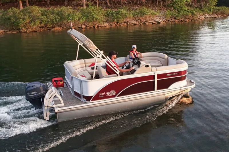 Slide: The Image of Manufacturer Provided Image: 2022 SunCatcher Select 16C pontoon boat cruising on a lake. - 9