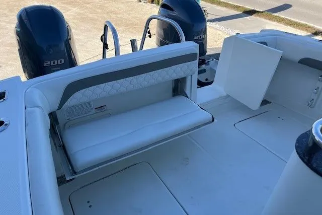 Slide: The Image of 2020 World Cat 280 CC-X boat interior with seating and dual engines. - 9