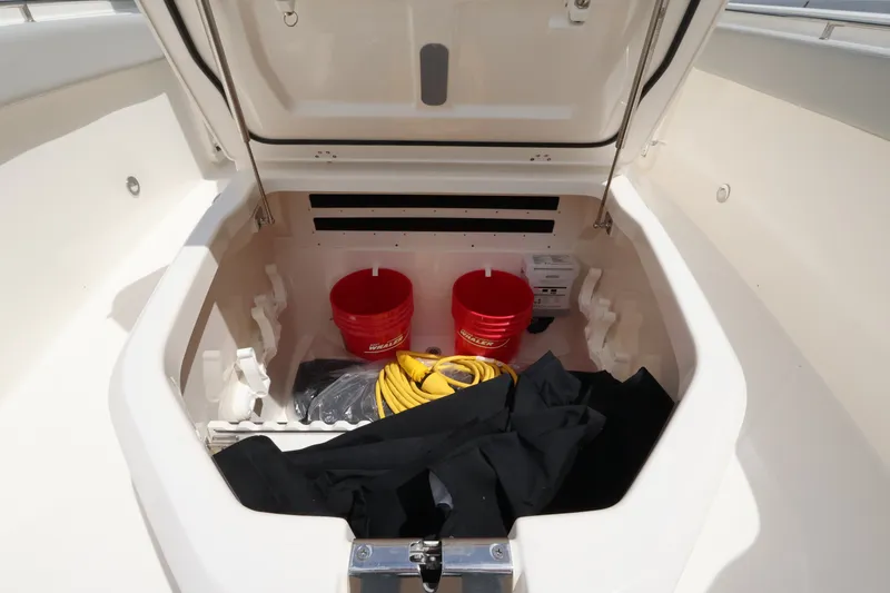 Slide: The Image of Bow storage compartment with buckets and ropes. - 39